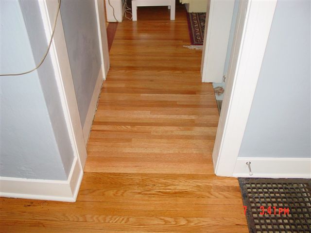 2-1/4 x 3/8 Oak. New wood against existing.
