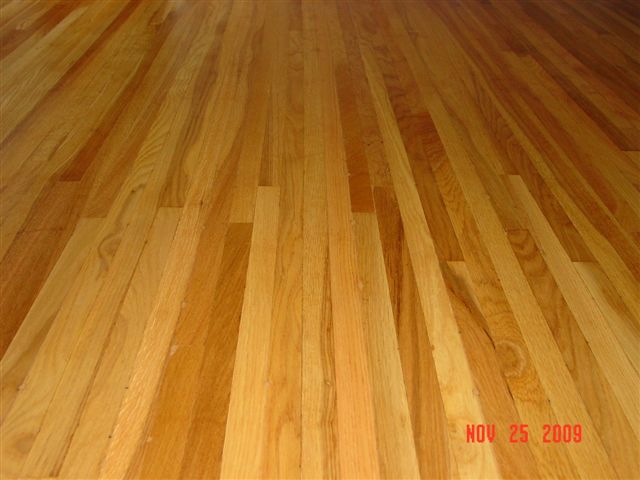 After picture.  Damaged floor restored.