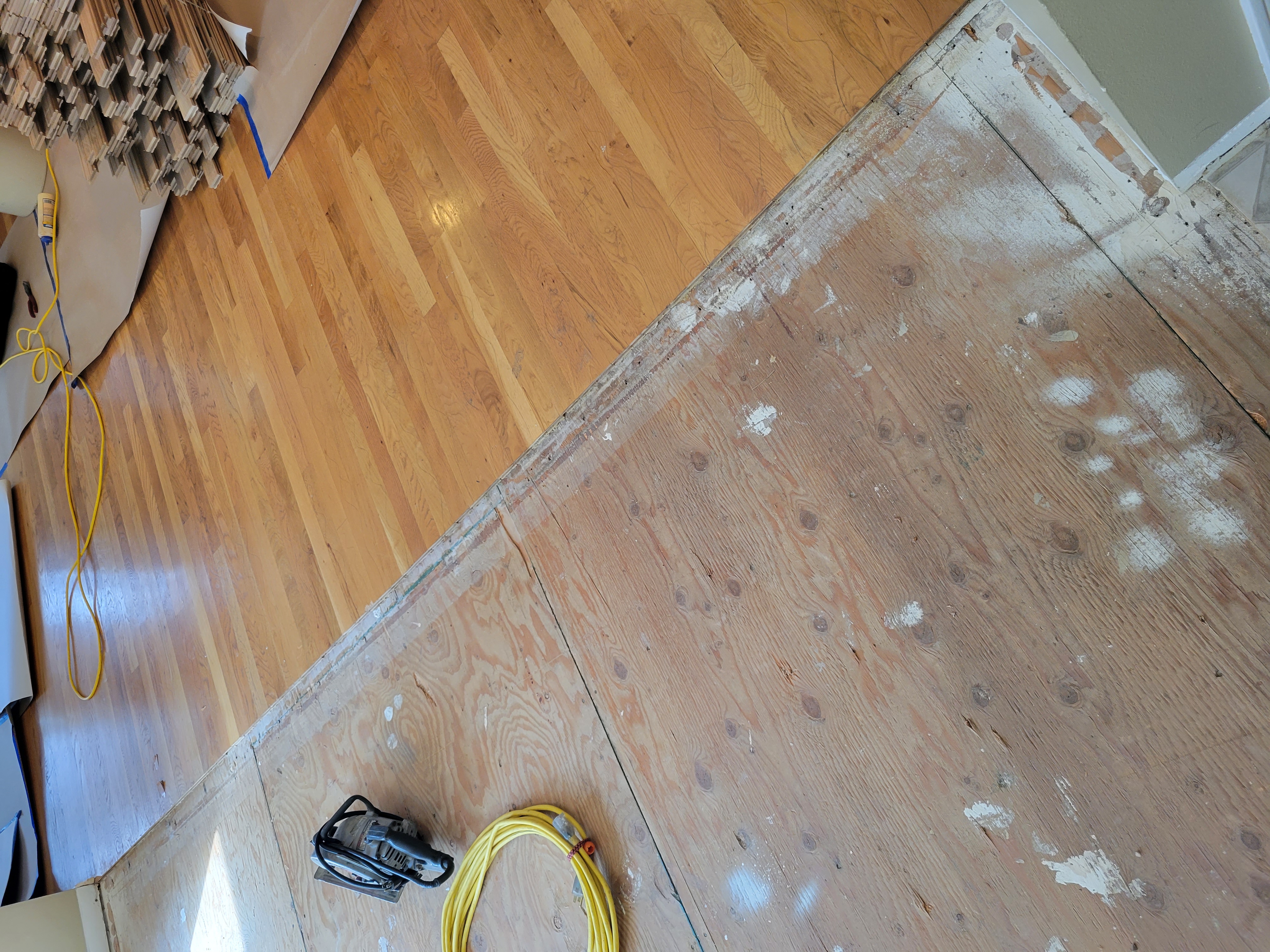 New red oak 2-1/4 x 3/4 flooring weaved into the existing red oak floor